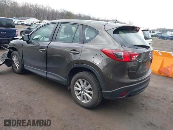 2016 Mazda CX-5 Sport with VIN JM3KE4BY8G0895209, listed as a IAAI auction lot 41688405 with 115,954 mi miles. Bid and sale history available at carsss.com. Image 3.