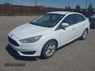 2015 Ford Focus SE z VIN 1FADP3F28FL334359, wystawiony jako IAAI lot #42520827 z przebiegiem 182 755 mil mil oraz . Historia ofert i sprzedaży dostępna na DreamBid. Obrazek 2.