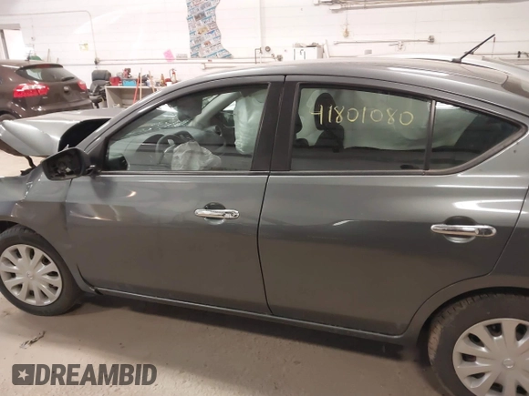 2018 Nissan Versa Sedan SV with VIN 3N1CN7AP7JL860195, listed as a IAAI auction lot 41801080 with 103,984 mi miles. Bid and sale history available at carsss.com. Image 15.
