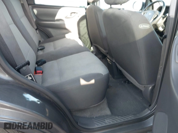 2004 Ford Escape with VIN 1FMCU02174KA61956, listed as a IAAI auction lot 41913605 with 166,587 mi miles and . Bid and sale history available at DreamBid. Image 8.