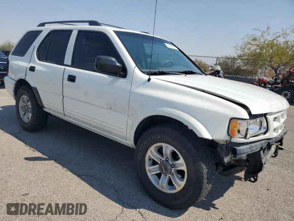 2000 Isuzu Rodeo S with VIN 4S2DM58WXY4302769, listed as a Copart auction lot 70416054 with 150,621 mi miles and Salvage Title. Bid and sale history available at DreamBid. Image 4.