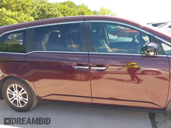 2011 Honda Odyssey EX-L with VIN 5FNRL5H60BB094647, listed as a IAAI auction lot 42223712 with 202,612 mi miles and . Bid and sale history available at carsss.com. Image 13.