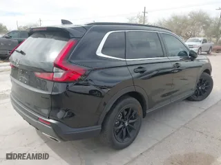 2023 Honda CR-V Hybrid Sport with VIN 7FARS5H55PE006228, listed as a IAAI auction lot 41730521 with 30,405 mi miles. Bid and sale history available at carsss.com. Image 4.