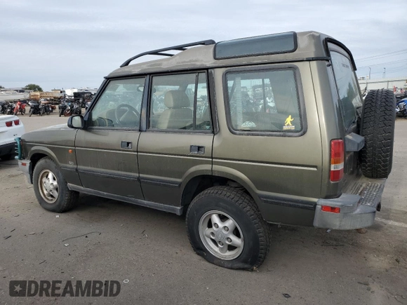 1997 Land Rover Discovery SD z VIN SALJY1249VA705067, wystawiony jako Copart lot #77047054 z przebiegiem 146 965 mil mil oraz Czysty tytuł • Clean title. Historia ofert i sprzedaży dostępna na DreamBid. Obrazek 2.