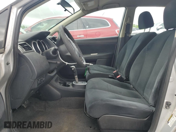2010 Nissan Versa S z VIN 3N1BC1AP9AL420459, wystawiony jako Copart lot #56132335 z przebiegiem 174 094 mil mil oraz Szkoda całkowita • Salvage title. Historia ofert i sprzedaży dostępna na DreamBid. Obrazek 7.