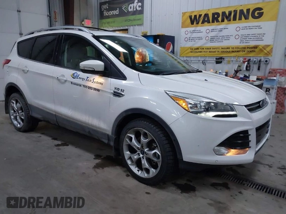 2016 Ford Escape Titanium with VIN 1FMCU9J94GUC79910, listed as a IAAI auction lot 41644467 with 43,261 mi miles. Bid and sale history available at carsss.com. Image 1.
