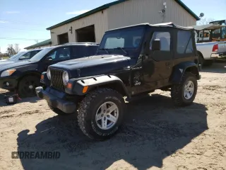 1998 Jeep Wrangler SE with VIN 1J4FY29P9WP793484, listed as a Copart auction lot 54482285 with 105,969 mi miles and Salvage title. Bid and sale history available at DreamBid. Image 1.