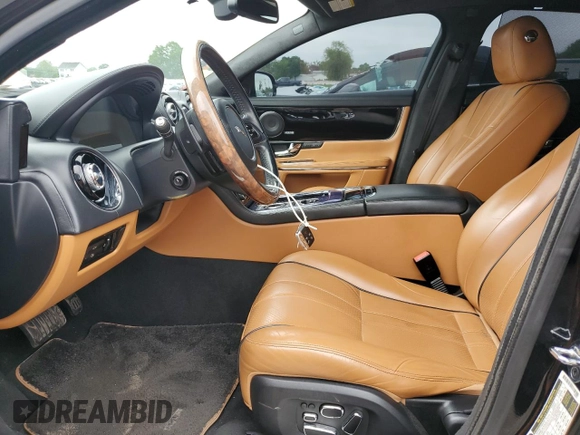 2013 Jaguar XJ Portfolio with VIN SAJWJ2GD0D8V44292, listed as a Copart auction lot 57073775 with 100,458 mi miles and Salvage Title. Bid and sale history available at DreamBid. Image 7.