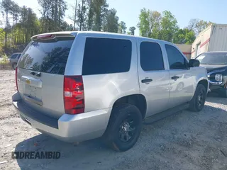 2013 Chevrolet Tahoe Commercial with VIN 1GNLC2E03DR124278, listed as a IAAI auction lot 39201429 with 182,584 mi miles and . Bid and sale history available at DreamBid. Image 4.