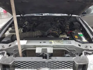 2005 Ford Explorer Sport Trac XLS with VIN 1FMZU77K25UB67905, listed as a IAAI auction lot 41808499 with 140,553 mi miles. Bid and sale history available at carsss.com. Image 10.