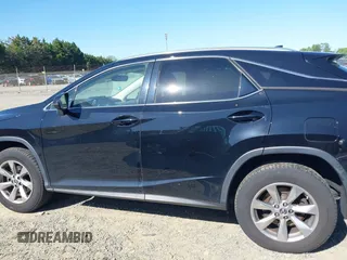 2019 Lexus RX 350 with VIN 2T2BZMCA0KC187304, listed as a IAAI auction lot 42138063 with 90,335 mi miles and . Bid and sale history available at DreamBid. Image 14.