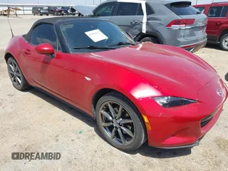 2016 Mazda MX-5 Miata Grand Touring z VIN JM1NDAD76G0109340, wystawiony jako IAAI lot #42093063 z przebiegiem 54 989 mil mil oraz . Historia ofert i sprzedaży dostępna na DreamBid. Obrazek 1.