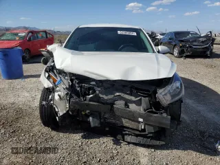 2022 Kia Rio LX with VIN 3KPA24AD5NE463323, listed as a Copart auction lot 52360084 with 17,581 mi miles and Salvage Title. Bid and sale history available at carsss.com. Image 5.