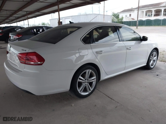 2014 Volkswagen Passat SE w/Sunroof with VIN 1VWBS7A31EC081968, listed as a IAAI auction lot 41963985 with 143,670 mi miles. Bid and sale history available at carsss.com. Image 4.