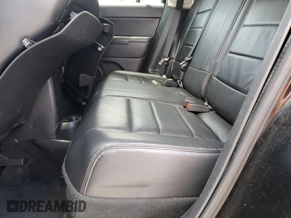 2014 Jeep Patriot Latitude z VIN 1C4NJPFA8ED679463, wystawiony jako Copart lot #57115775 z przebiegiem 183 218 mil mil oraz Szkoda całkowita • Salvage title. Historia ofert i sprzedaży dostępna na DreamBid. Obrazek 11.