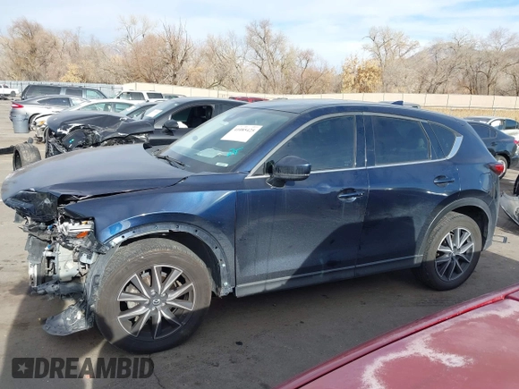 2017 Mazda CX-5 Grand Touring with VIN JM3KFBDL3H0149397, listed as a IAAI auction lot 41085425 with 161,675 mi miles. Bid and sale history available at carsss.com. Image 14.