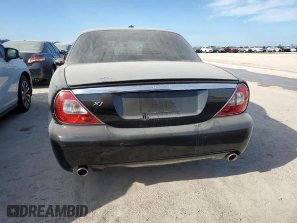 2008 Jaguar XJ with VIN SAJWA71B18SH25255, listed as a Copart auction lot 74781714 with 31,233 mi miles and Salvage Title. Bid and sale history available at carsss.com. Image 6.