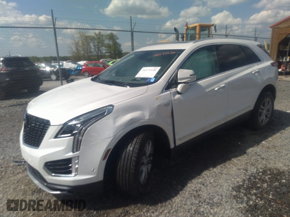 2023 Cadillac XT5 AWD Premium Luxury with VIN 1GYKNDRS5PZ141071, listed as a IAAI auction lot 36571530 with 2,822 mi miles and . Bid and sale history available at DreamBid. Image 2.