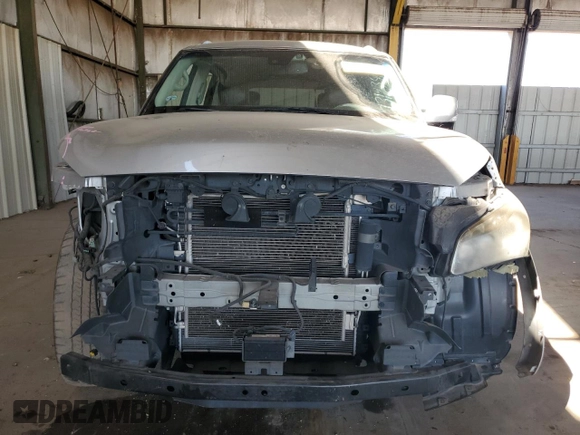 2012 Infiniti QX56 7-passenger with VIN JN8AZ2NF8C9515013, listed as a Copart auction lot 73123884 with 124,300 mi miles and Salvage Title. Bid and sale history available at carsss.com. Image 5.
