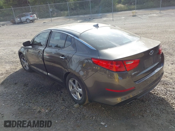 2015 Kia Optima LX with VIN 5XXGM4A77FG353705, listed as a IAAI auction lot 42519873 with 126,066 mi miles and . Bid and sale history available at DreamBid. Image 3.