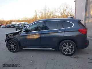 2017 BMW X1 xDrive28i with VIN WBXHT3C33H5F87591, listed as a IAAI auction lot 41256899 with 69,362 mi miles. Bid and sale history available at carsss.com. Image 14.