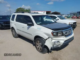 2011 Honda Pilot Touring z VIN 5FNYF3H91BB010112, wystawiony jako IAAI lot #42321057 z przebiegiem 193 615 mil mil oraz . Historia ofert i sprzedaży dostępna na DreamBid. Obrazek 1.