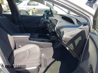 2016 Toyota Prius Two z VIN JTDKBRFU8G3007885, wystawiony jako IAAI lot #41980383 z przebiegiem 162 740 mil mil oraz . Historia ofert i sprzedaży dostępna na DreamBid. Obrazek 5.