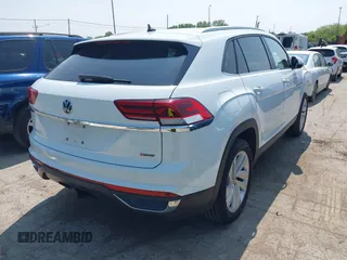 2022 Volkswagen Atlas SE z VIN 1V2HE2CA5NC225233, wystawiony jako IAAI lot #42366811 z przebiegiem 27 986 mil mil oraz . Historia ofert i sprzedaży dostępna na DreamBid. Obrazek 4.