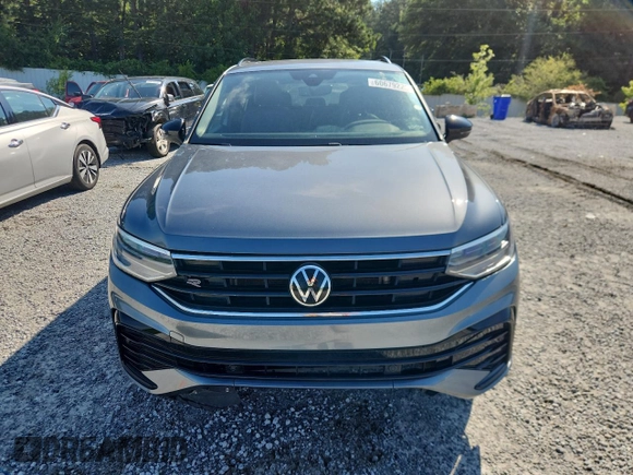 2023 Volkswagen Tiguan SE R-Line Black with VIN 3VVCB7AX3PM056471, listed as a Copart auction lot 60679225 with 94,752 mi miles and Clean title. Bid and sale history available at DreamBid. Image 5.