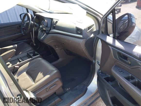 2019 Honda Odyssey EX-L with VIN 5FNRL6H79KB043145, listed as a IAAI auction lot 41569198 with 94,560 mi miles. Bid and sale history available at carsss.com. Image 5.