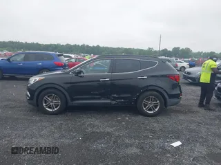 2017 Hyundai Santa Fe 2.4L with VIN 5NMZUDLB8HH009282, listed as a IAAI auction lot 42512122 with 81,744 mi miles and . Bid and sale history available at DreamBid. Image 14.
