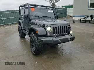 2017 Jeep Wrangler Sport z VIN 1C4AJWAG4HL563093, wystawiony jako Copart lot #51603125 z przebiegiem 105 618 mil mil oraz Szkoda całkowita • Salvage title. Historia ofert i sprzedaży dostępna na DreamBid. Obrazek 14.