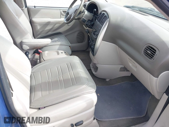 2007 Chrysler Town & Country Touring z VIN 2A4GP54L17R125711, wystawiony jako IAAI lot #41865946 z przebiegiem 169 558 mil mil oraz . Historia ofert i sprzedaży dostępna na DreamBid. Obrazek 5.