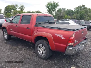 2005 Toyota Tacoma with VIN 5TELU42N95Z053076, listed as a IAAI auction lot 42748710 with 137,665 mi miles and . Bid and sale history available at DreamBid. Image 3.