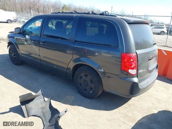 2012 Dodge Grand Caravan SE with VIN 2C4RDGBG1CR214021, listed as a IAAI auction lot 41765065 with 210,794 mi miles. Bid and sale history available at carsss.com. Image 3.
