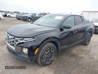 2022 Hyundai Santa Cruz SEL z VIN 5NTJBDAE5NH008011, wystawiony jako IAAI lot #41614699 z przebiegiem 57 484 mil mil oraz . Historia ofert i sprzedaży dostępna na DreamBid. Obrazek 17.