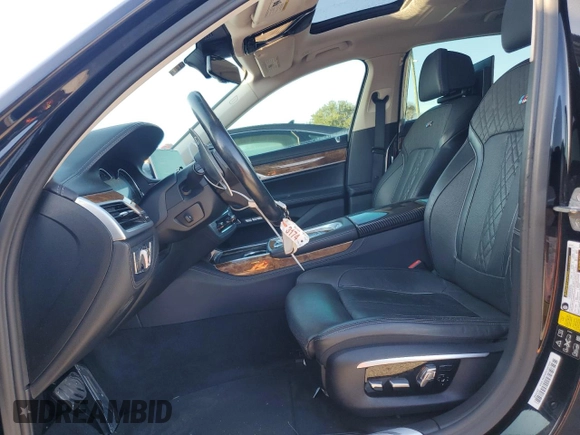 2017 BMW 7 Series 740i xDrive with VIN WBA7E4C34HGU99964, listed as a Copart auction lot 69808464 with 93,423 mi miles and Non Repairable. Bid and sale history available at carsss.com. Image 7.