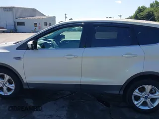 2013 Ford Escape SE with VIN 1FMCU0GX2DUB85361, listed as a IAAI auction lot 42552881 with 211,032 mi miles and . Bid and sale history available at DreamBid. Image 14.