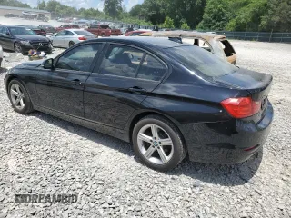 2015 BMW 3 Series 328i xDrive with VIN WBA3B5G58FNS15964, listed as a Copart auction lot 61783435 with 149,974 mi miles and Salvage title. Bid and sale history available at DreamBid. Image 2.