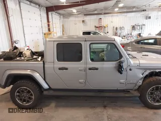 2021 Jeep Gladiator High Altitude with VIN 1C6HJTFG1ML556741, listed as a IAAI auction lot 42240680 with 47,926 mi miles and . Bid and sale history available at DreamBid. Image 13.