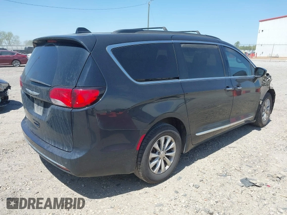 2017 Chrysler Pacifica Touring L with VIN 2C4RC1BG7HR539716, listed as a IAAI auction lot 42037822 with 160,623 mi miles and . Bid and sale history available at DreamBid. Image 4.