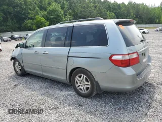2005 Honda Odyssey EX-L with VIN 5FNRL38765B088756, listed as a Copart auction lot 57071365 with 243,277 mi miles and Salvage title. Bid and sale history available at DreamBid. Image 2.