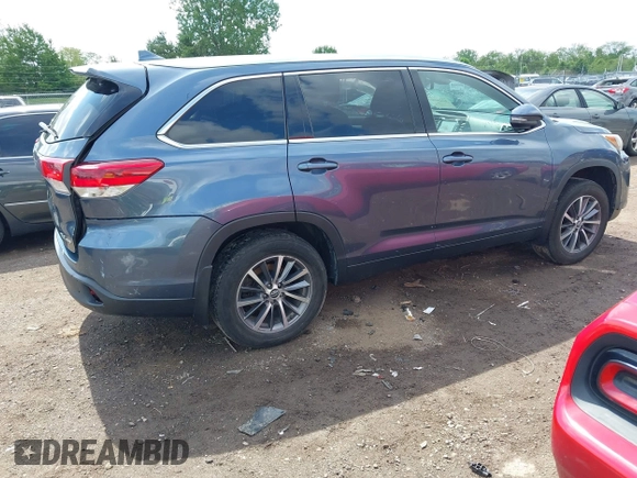 2019 Toyota Highlander SE with VIN 5TDJZRFH2KS975689, listed as a IAAI auction lot 42250723 with 88,043 mi miles and . Bid and sale history available at DreamBid. Image 4.
