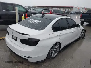2013 BMW 3 Series 328i with VIN WBA3A5C5XDF356793, listed as a IAAI auction lot 40881444 with 156,178 mi miles. Bid and sale history available at carsss.com. Image 4.