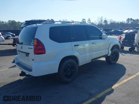 2004 Lexus GX 470 with VIN JTJBT20XX40063036, listed as a IAAI auction lot 41780865 with 222,285 mi miles. Bid and sale history available at carsss.com. Image 4.