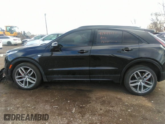2021 Cadillac XT4 AWD Sport with VIN 1GYFZFR48MF009552, listed as a IAAI auction lot 41743125 with 53,982 mi miles and . Bid and sale history available at DreamBid. Image 14.