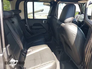 2021 Jeep Gladiator High Altitude z VIN 1C6HJTFG1ML597581, wystawiony jako IAAI lot #42191690 z przebiegiem 47 740 mil mil oraz . Historia ofert i sprzedaży dostępna na DreamBid. Obrazek 8.