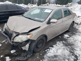 2009 Toyota Corolla with VIN 1NXBU40E19Z052903, listed as a IAAI auction lot 41305719 with 141,625 mi miles and . Bid and sale history available at carsss.com. Image 2.