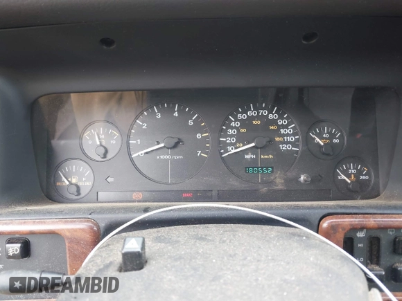 1998 Jeep Grand Cherokee Limited z VIN 1J4GZ78Y5WC261391, wystawiony jako IAAI lot #42275913 z przebiegiem 180 552 mil mil oraz . Historia ofert i sprzedaży dostępna na DreamBid. Obrazek 7.