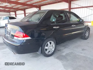 2006 Mitsubishi Lancer ES with VIN JA3AJ26E46U059729, listed as a IAAI auction lot 39740605 with 169,306 mi miles. Bid and sale history available at carsss.com. Image 4.